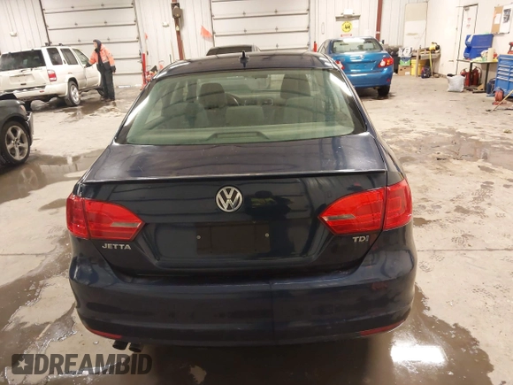 2012 Volkswagen Jetta Sedan TDI with VIN 3VW3L7AJ8CM378733, listed as a IAAI auction lot 41571197 with 151,159 mi miles. Bid and sale history available at carsss.com. Image 16.