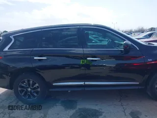 2015 Infiniti QX60 with VIN 5N1AL0MN6FC522202, listed as a IAAI auction lot 41713786 with 206,448 mi miles and . Bid and sale history available at DreamBid. Image 13.