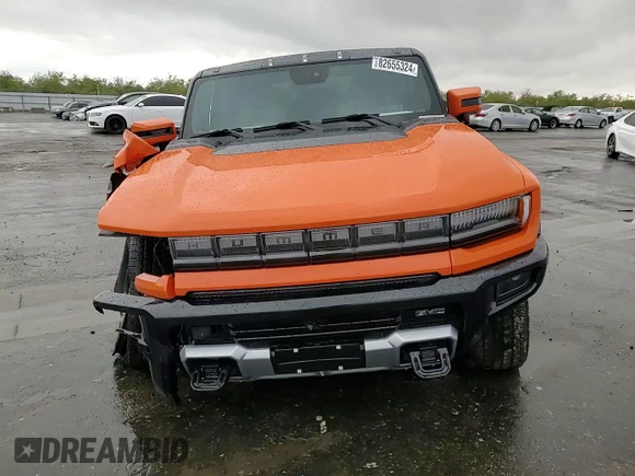 2024 GMC Hummer EV 3X z VIN 1GKB0RDC6RU107095, wystawiony jako Copart lot #82655324 z przebiegiem 6013 mil mil oraz Szkody całkowita. Historia ofert i sprzedaży dostępna na DreamBid. Obrazek 12.