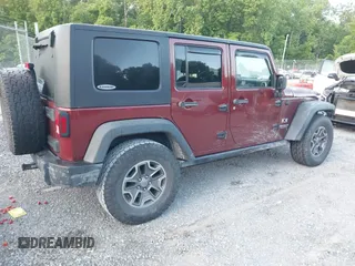 2008 Jeep Wrangler Unlimited X z VIN 1J4GA39128L568988, wystawiony jako IAAI lot #42445403 z przebiegiem 198 032 mil mil oraz . Historia ofert i sprzedaży dostępna na DreamBid. Obrazek 4.