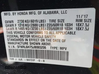 2018 Honda Odyssey EX-L with VIN 5FNRL6H75JB065206, listed as a IAAI auction lot 42009227 with 133,652 mi miles. Bid and sale history available at carsss.com. Image 9.