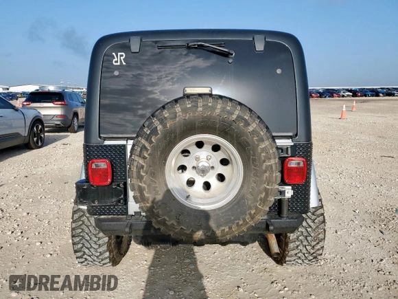 2005 Jeep Wrangler X с VIN 1J4FA39S45P353119, выставлен на аукционе Copart как лот 64206825 с пробегом 134 298 миль миль и Списание • Salvage title. История ставок и продаж доступна на DreamBid. Изображение 6.