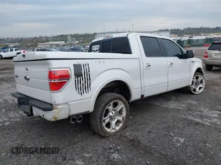 2011 Ford F-150 Lariat with VIN 1FTFW1E63BFB80098, listed as a IAAI auction lot 42038087 with 243,992 mi miles. Bid and sale history available at carsss.com. Image 4.
