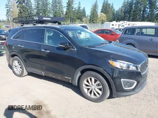 2018 Kia Sorento LX V6 with VIN 5XYPGDA58JG403974, listed as a IAAI auction lot 41233326 with 58,099 mi miles. Bid and sale history available at carsss.com. Image 1.