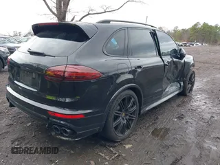 2016 Porsche Cayenne GTS z VIN WP1AD2A20GLA75034, wystawiony jako IAAI lot #41913467 z przebiegiem 79 503 mil mil oraz . Historia ofert i sprzedaży dostępna na DreamBid. Obrazek 4.
