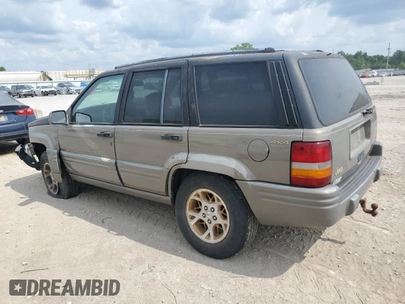 1996 Jeep Grand Cherokee Limited with VIN 1J4GZ78S3TC395758, listed as a Copart auction lot 60326205 with Not provided miles and Salvage title. Bid and sale history available at DreamBid. Image 2.