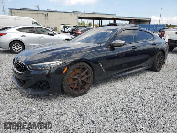 2020 BMW 8 Series M850i z VIN WBAGV8C06LBP48901, wystawiony jako Copart lot #57595725 z przebiegiem 88 332 mil mil oraz Czysty tytuł • Clean title. Historia ofert i sprzedaży dostępna na DreamBid. Obrazek 1.