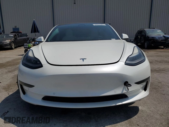 2021 Tesla Model 3 Long Range z VIN 5YJ3E1EB7MF093184, wystawiony jako Copart lot #58060385 z przebiegiem 51 678 mil mil oraz Nie do naprawy • Non repairable. Historia ofert i sprzedaży dostępna na DreamBid. Obrazek 5.