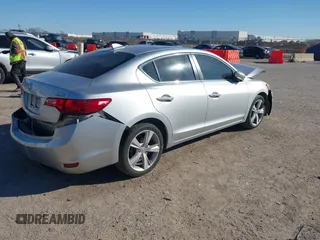 2014 Acura ILX Technology with VIN 19VDE1F72EE004913, listed as a IAAI auction lot 41421099 with 101,895 mi miles and . Bid and sale history available at DreamBid. Image 4.