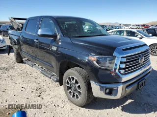 2021 Toyota Tundra Platinum with VIN 5TFAY5F16MX021555, listed as a Copart auction lot 46720185 with 136,112 mi miles and Salvage title. Bid and sale history available at DreamBid. Image 4.