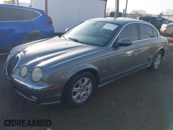 2003 Jaguar S-Type with VIN SAJEA01T23FM93839, listed as a IAAI auction lot 41891973 with 153,761 mi miles and . Bid and sale history available at DreamBid. Image 17.