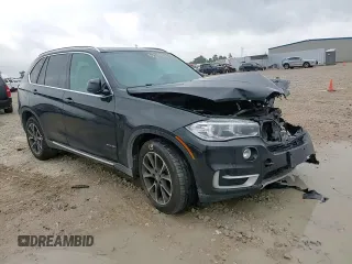 2014 BMW X5 xDrive35i z VIN 5UXKR0C59E0H23070, wystawiony jako Copart lot #55814815 z przebiegiem 113 895 mil mil oraz Szkody całkowita. Historia ofert i sprzedaży dostępna na DreamBid. Obrazek 13.