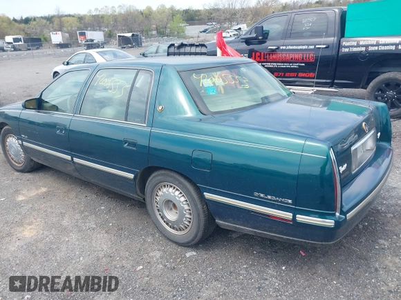 1999 Cadillac DeVille DHS z VIN 1G6KE54Y9XU766791, wystawiony jako IAAI lot #42005553 z przebiegiem 140 515 mil mil oraz . Historia ofert i sprzedaży dostępna na DreamBid. Obrazek 3.