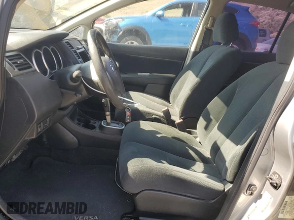 2010 Nissan Versa S with VIN 3N1BC1AP8AL457552, listed as a Copart auction lot 59703695 with 149,160 mi miles and Salvage title. Bid and sale history available at DreamBid. Image 7.