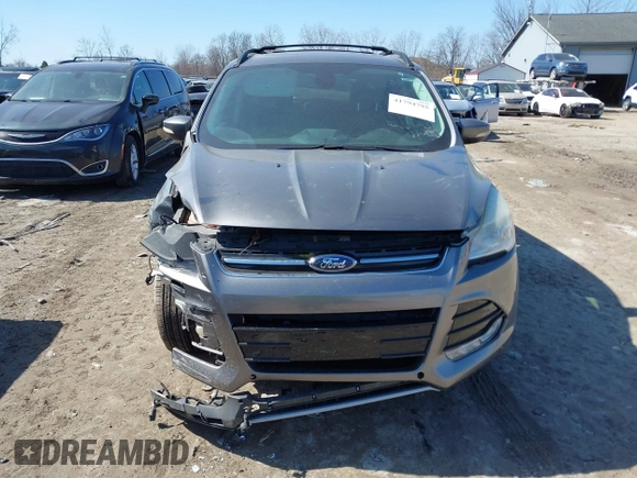 2013 Ford Escape SEL with VIN 1FMCU9H98DUB89046, listed as a IAAI auction lot 41794795 with 89,819 mi miles and . Bid and sale history available at DreamBid. Image 12.