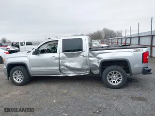 2014 GMC Sierra 1500 SLE with VIN 3GTU2UEC0EG558486, listed as a IAAI auction lot 41750451 with 173,098 mi miles. Bid and sale history available at carsss.com. Image 14.