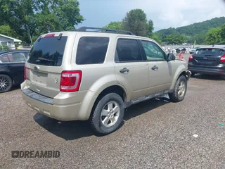 2012 Ford Escape XLT with VIN 1FMCU0D77CKB01050, listed as a IAAI auction lot 42513535 with 190,526 mi miles and . Bid and sale history available at DreamBid. Image 4.