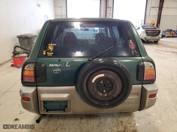 1998 Toyota RAV4 with VIN JT3GP10V9W7040240, listed as a Copart auction lot 88218835 with 309,410 mi miles and Clean Title. Bid and sale history available at carsss.com. Image 6.