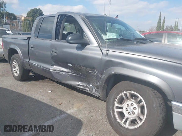 2003 Dodge Dakota SLT with VIN 1D7HL48N23S247441, listed as a IAAI auction lot 41359296 with 58,414 mi miles. Bid and sale history available at carsss.com. Image 6.