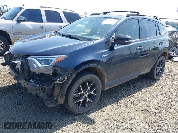 2018 Toyota RAV4 Hybrid SE with VIN JTMJJREV9JD191552, listed as a IAAI auction lot 42158665 with 84,025 mi miles and . Bid and sale history available at DreamBid. Image 18.