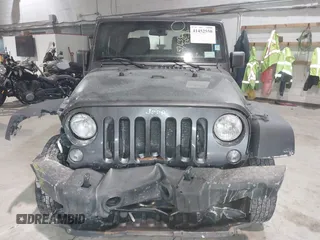 2014 Jeep Wrangler Sport with VIN 1C4AJWAG6EL167579, listed as a IAAI auction lot 41801276 with 137,639 mi miles and . Bid and sale history available at DreamBid. Image 6.