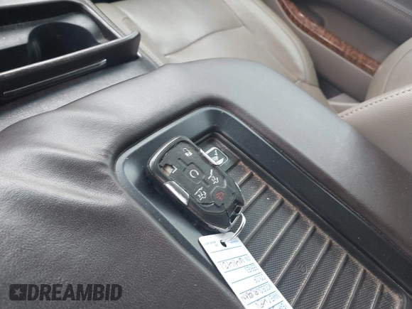 2015 Chevrolet Suburban LTZ with VIN 1GNSCKKC7FR641421, listed as a IAAI auction lot 41637137 with 139,001 mi miles and . Bid and sale history available at DreamBid. Image 11.