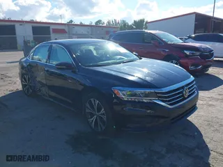 2022 Volkswagen Passat 2.0T SE with VIN 1VWSA7A34NC008256, listed as a IAAI auction lot 41673218 with 59,594 mi miles. Bid and sale history available at carsss.com. Image 1.