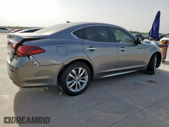 2015 Infiniti Q70 with VIN JN1BY1AR1FM561848, listed as a Copart auction lot 56432875 with 145,158 mi miles and Salvage title. Bid and sale history available at DreamBid. Image 3.