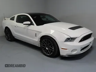 2011 Ford Mustang GT500 with VIN 1ZVBP8JS8B5154011, listed as a Copart auction lot 52013765 with 20,963 mi miles and Salvage Title. Bid and sale history available at carsss.com. Image 1.