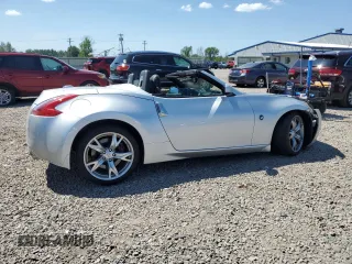 2012 Nissan 370Z Touring with VIN JN1AZ4FH3CM370910, listed as a Copart auction lot 65940005 with 23,009 mi miles and Salvage title. Bid and sale history available at DreamBid. Image 3.