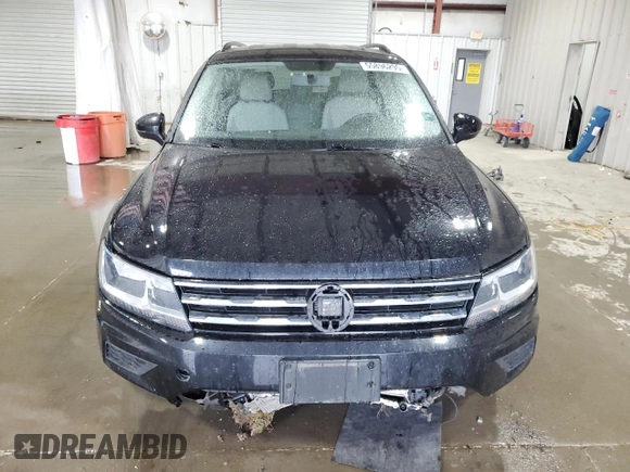 2021 Volkswagen Tiguan S z VIN 3VV0B7AX4MM015717, wystawiony jako Copart lot #55896295 z przebiegiem 78 821 mil mil oraz Szkoda całkowita • Salvage title. Historia ofert i sprzedaży dostępna na DreamBid. Obrazek 5.
