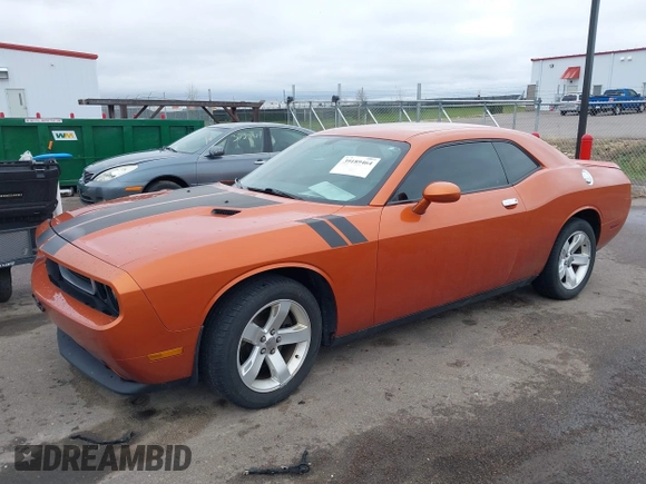 2011 Dodge Challenger with VIN 2B3CJ4DG0BH511006, listed as a IAAI auction lot 39189464 with 148,139 mi miles. Bid and sale history available at carsss.com. Image 2.