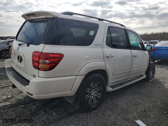 2002 Toyota Sequoia Limited with VIN 5TDZT38A52S064824, listed as a Copart auction lot 82301084 with 310,639 mi miles and Salvage Title. Bid and sale history available at carsss.com. Image 3.