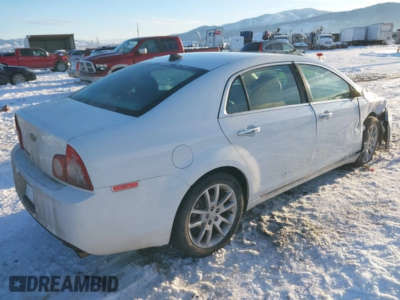 2012 Chevrolet Malibu LTZ with VIN 1G1ZG5E73CF270839, listed as a IAAI auction lot 41284490 with 133,423 mi miles and . Bid and sale history available at DreamBid. Image 4.