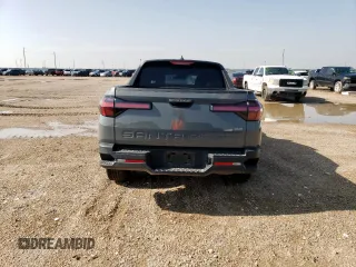 2023 Hyundai Santa Cruz SEL with VIN 5NTJBDAEXPH061824, listed as a Copart auction lot 59975255 with 56,492 mi miles and Salvage title. Bid and sale history available at DreamBid. Image 6.