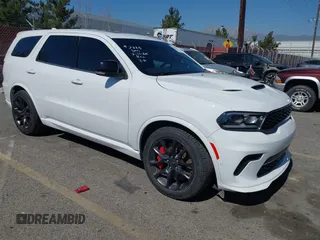 2021 Dodge Durango SRT Hellcat with VIN 1C4SDJH98MC822779, listed as a IAAI auction lot 41621673 with 44,953 mi miles and . Bid and sale history available at DreamBid. Image 1.