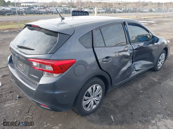 2020 Subaru Impreza with VIN 4S3GTAA66L1714762, listed as a IAAI auction lot 41154150 with 63,009 mi miles. Bid and sale history available at carsss.com. Image 4.