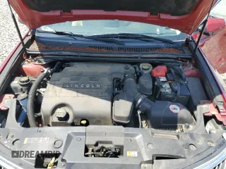 2013 Lincoln MKS z VIN 1LNHL9DK5DG607319, wystawiony jako Copart lot #54302285 z przebiegiem 170 099 mil mil oraz Szkoda całkowita • Salvage title. Historia ofert i sprzedaży dostępna na DreamBid. Obrazek 11.