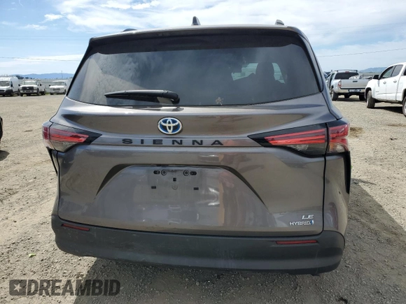 2022 Toyota Sienna LE с VIN 5TDKRKEC6NS077795, выставлен на аукционе Copart как лот 52788715 с пробегом 33 758 миль миль и Списание • Salvage title. История ставок и продаж доступна на DreamBid. Изображение 6.