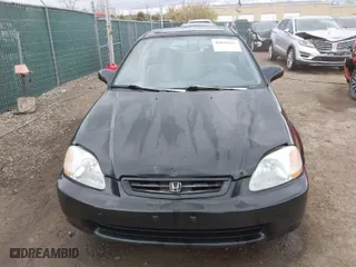 1997 Honda Civic EX with VIN 1HGEJ8242VL044722, listed as a IAAI auction lot 42045941 with 266,481 mi miles. Bid and sale history available at carsss.com. Image 12.