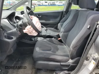 2009 Honda Fit Sport with VIN JHMGE88439S029286, listed as a Copart auction lot 63357784 with 112,705 mi miles and Salvage Title. Bid and sale history available at carsss.com. Image 7.