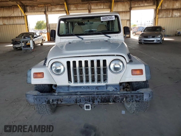 1999 Jeep Wrangler Sport с VIN 1J4FY19S9XP414239, выставлен на аукционе Copart как лот 66882505 с пробегом 131 916 миль миль и Чистый • Clean title. История ставок и продаж доступна на DreamBid. Изображение 5.