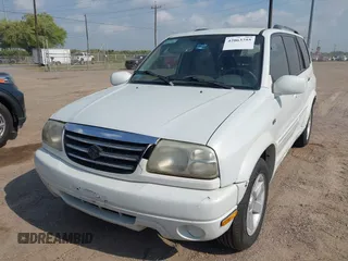 2003 Suzuki XL7 Touring z VIN JS3TY92V534106381, wystawiony jako IAAI lot #42063755 z przebiegiem 190 917 mil mil oraz . Historia ofert i sprzedaży dostępna na DreamBid. Obrazek 2.