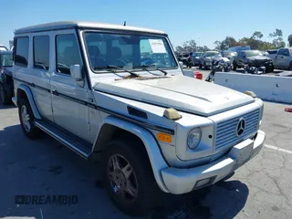 2002 Mercedes-Benz G-Class with VIN WDCYR49E02X129195, listed as a IAAI auction lot 41871996 with 200,945 mi miles. Bid and sale history available at carsss.com. Image 1.