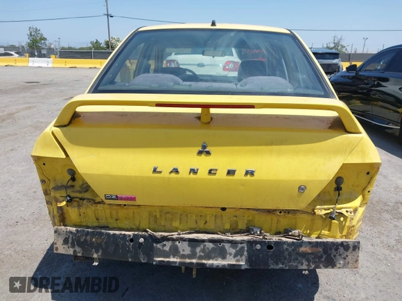 2002 Mitsubishi Lancer OZ-Rally z VIN JA3AJ86EX2U073129, wystawiony jako IAAI lot #42337379 z przebiegiem 257 556 mil mil oraz . Historia ofert i sprzedaży dostępna na DreamBid. Obrazek 17.