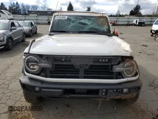 2023 Ford Bronco with VIN 1FMEE5BP0PLB59328, listed as a Copart auction lot 47301845 with 24,699 mi miles and Salvage Title. Bid and sale history available at carsss.com. Image 5.