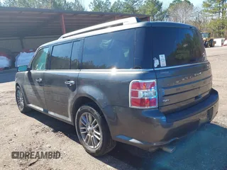 2018 Ford Flex SEL z VIN 2FMGK5C8XJBA17780, wystawiony jako IAAI lot #41600772 z przebiegiem 162 962 mil mil oraz . Historia ofert i sprzedaży dostępna na DreamBid. Obrazek 3.