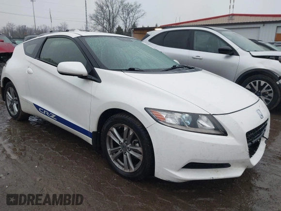2013 Honda CR-Z with VIN JHMZF1D42DS000230, listed as a IAAI auction lot 41433713 with 128,887 mi miles. Bid and sale history available at carsss.com. Image 1.