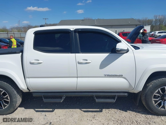 2023 Toyota Tacoma 4WD SR with VIN 3TMCZ5AN8PM647523, listed as a IAAI auction lot 41887896 with 17,864 mi miles. Bid and sale history available at carsss.com. Image 13.