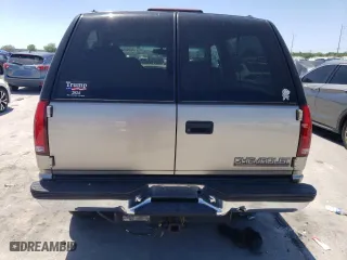 1999 Chevrolet Tahoe with VIN 3GNEK18RXXG190783, listed as a Copart auction lot 52666545 with 240,094 mi miles and Salvage Title. Bid and sale history available at carsss.com. Image 6.
